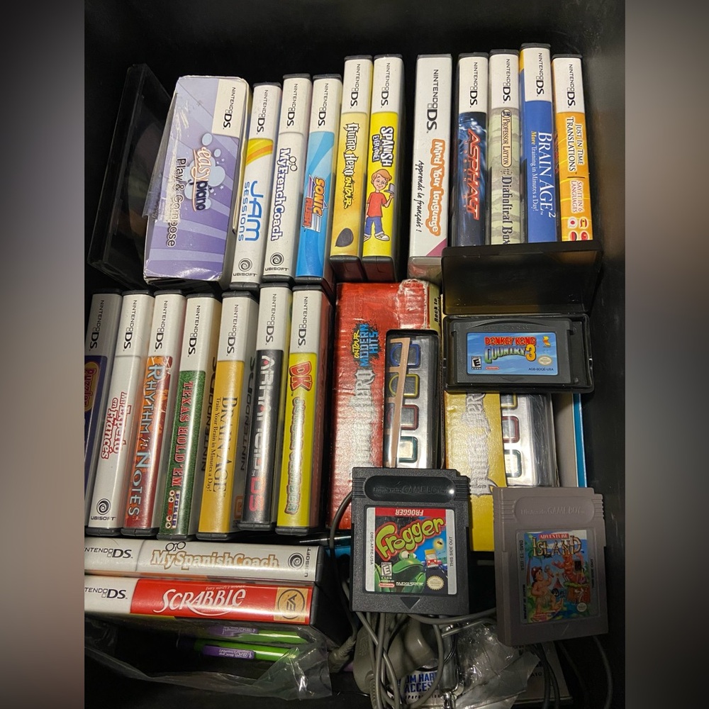 Nintendo DS games and charger as well as game boy and game boy advance games